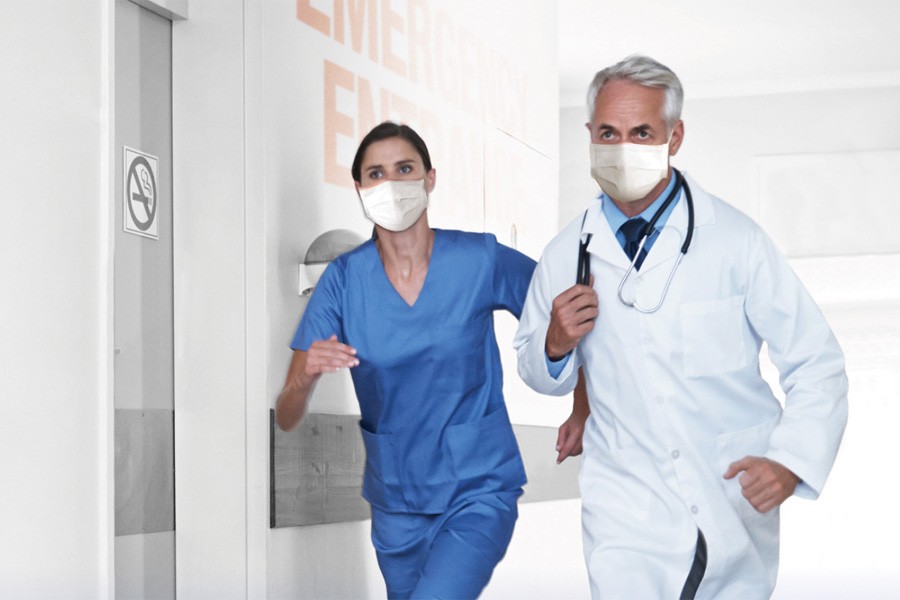Nurse and doctor running toward emergency