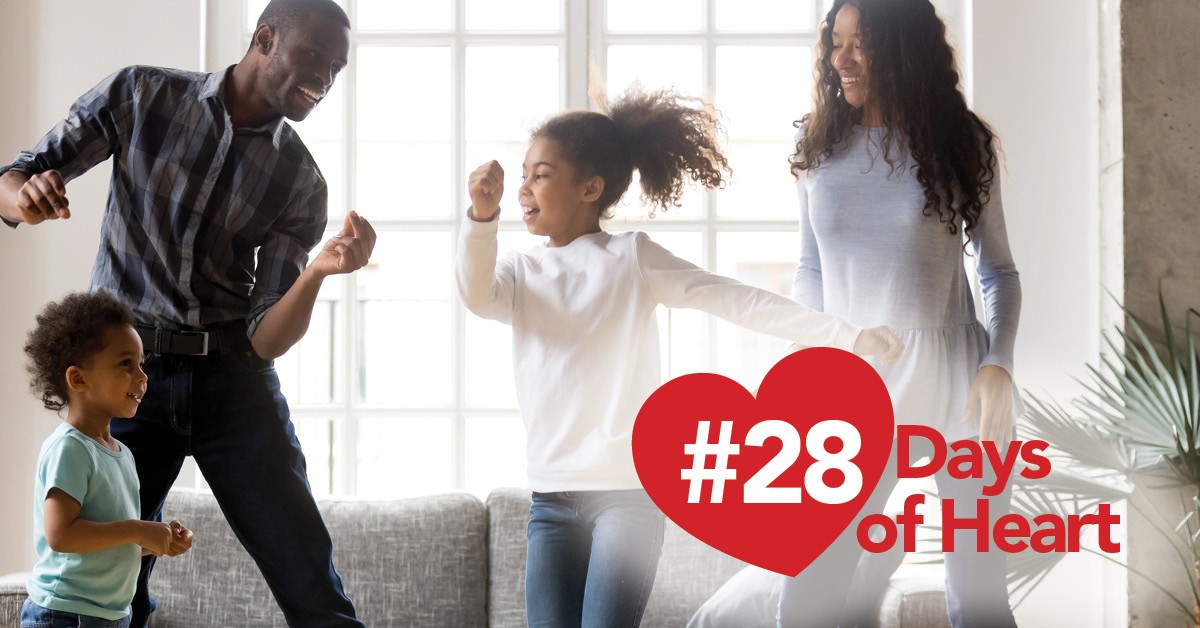 28 Days of Heart: African American family dancing in home